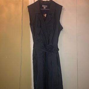 A stretch denim faux wrap dress with a belt.